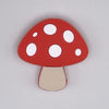 top view of a pile of Red Mushroom Silicone Focal Bead Accessory - 30mm x 29mm