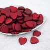 Front view of a pile of 20mm Red Rubberized Style Heart Beads