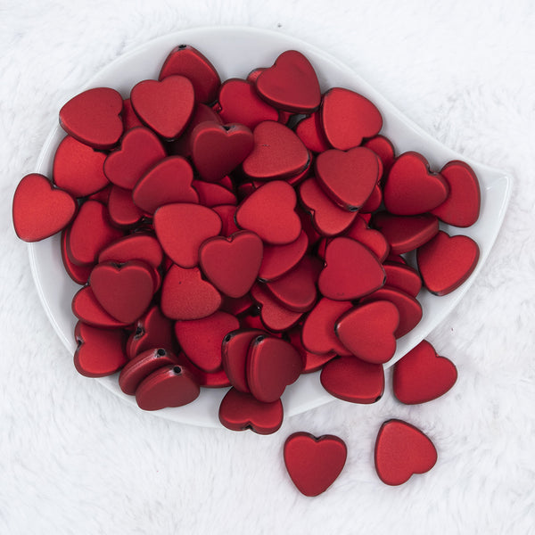 Top view of a pile of 20mm Red Rubberized Style Heart Beads