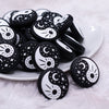 front view of a pile of Yin and Yang Silicone Focal Bead Accessory