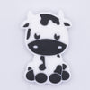 Top view of Black and White Cow Silicone Focal Bead Accessory - 22mm x 34mm