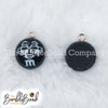 Top picture of a pile of Black 16mm Candy M & M Resin charms