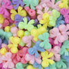 Close up view of a pile of Pastel Bow Knot Shaped Opaque Acrylic Chunky Bubblegum Beads