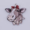 top view of a pile of Cow with Bow Pendant with hoop 35x27mm