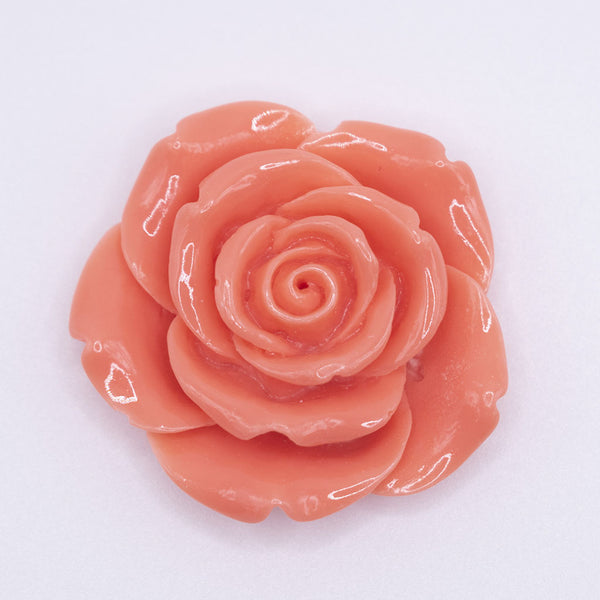 Front view of a 42mm Coral Orange Acrylic Rose Flower focal pendant