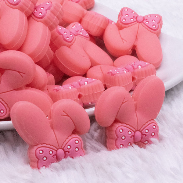 macro view of Coral Bunny Ears Silicone Focal Bead Accessory - 26mm x 26mm
