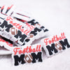 Close up view of Football Mom Silicone Focal Bead Accessory