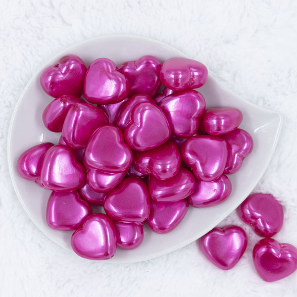 Top view of a pile of 27mm Hot Pink Pearl Heart Acrylic Bubblegum Beads