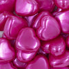 Close up view of a pile of 27mm Hot Pink Pearl Heart Acrylic Bubblegum Beads