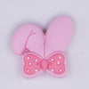 close up view of Light Pink Bunny Ears Silicone Focal Bead Accessory - 26mm x 26mm