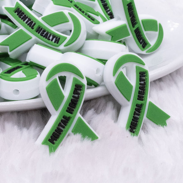 Close up view of Mental Health Awareness Silicone Focal Bead Accessory