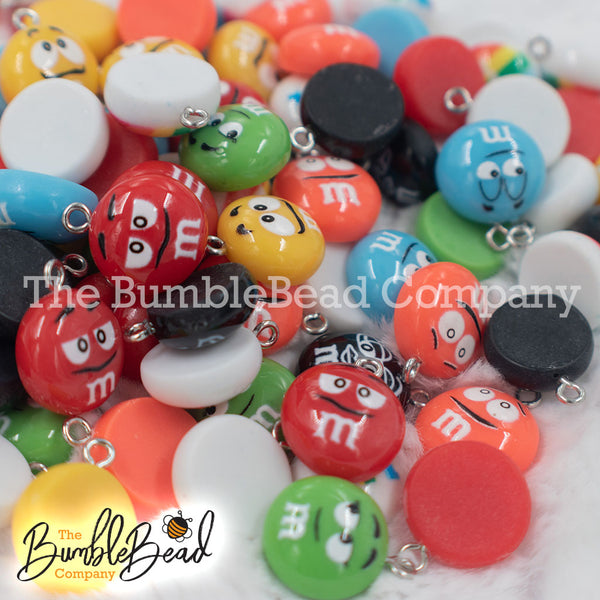 Group picture of a pile of 16mm Candy M & M Resin charms