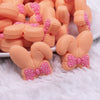 macro view of Orange Bunny Ears Silicone Focal Bead Accessory - 26mm x 26mm