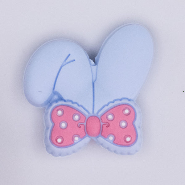 close up view of Pastel Blue Bunny Ears Silicone Focal Bead Accessory - 26mm x 26mm