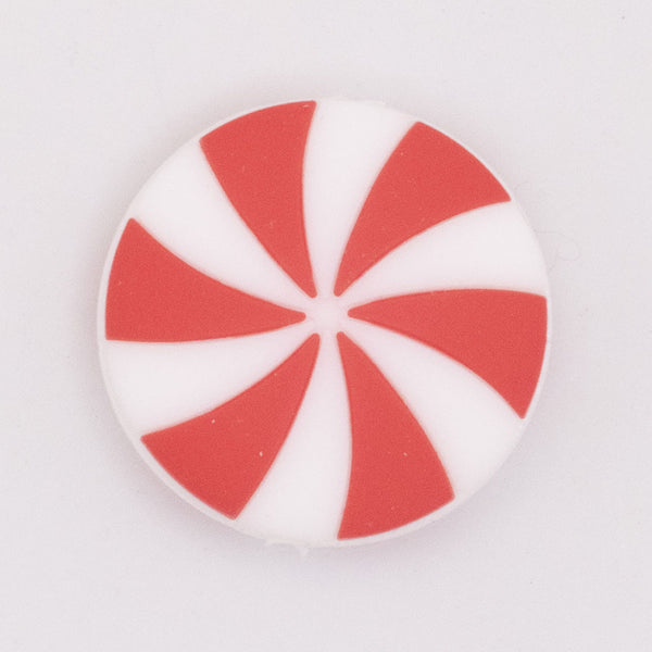 Close up view of Red and White Peppermint Candy Silicone Focal Bead Accessory - 28mm x 28mm