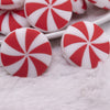 Macro view of Red and White Peppermint Candy Silicone Focal Bead Accessory - 28mm x 28mm