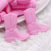 macro view of a pile of Pink Cowboy Boot Silicone Focal Bead Accessory - 30mm x 26mm