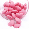 Top view of a pile of 20mm Pink heart silicone bead