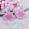 macro view of a pile of Pink Snowflake Silicone Focal Bead Accessory - 28mm x 28mm