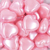 Close up view of a pile of 27mm Pink Pearl Heart Acrylic Bubblegum Beads
