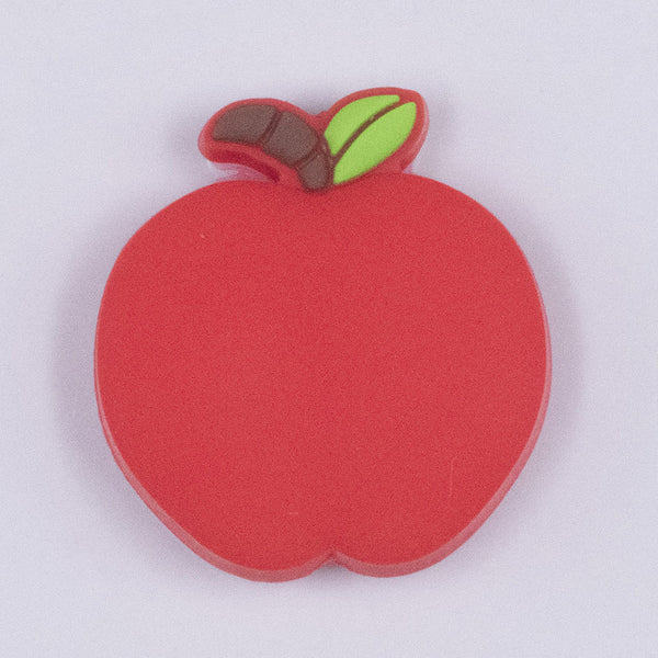 Top view of a pile of Red Apple Silicone Focal Bead Accessory - 30mm x 27mm