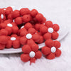 front view of a pile of Red Flower Silicone Focal Bead Accessory - 26mm x 26mm