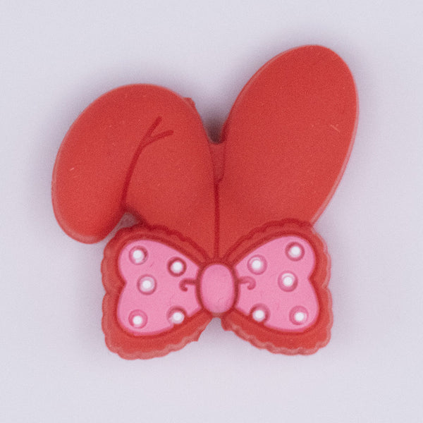 close up view of Red Bunny Ears Silicone Focal Bead Accessory - 26mm x 26mm