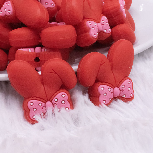 macro view of Red Bunny Ears Silicone Focal Bead Accessory - 26mm x 26mm
