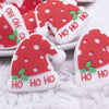 close up view of a pile of Ho Ho Ho Santa Hat Silicone Focal Bead Accessory