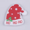 top view of a pile of Ho Ho Ho Santa Hat Silicone Focal Bead Accessory