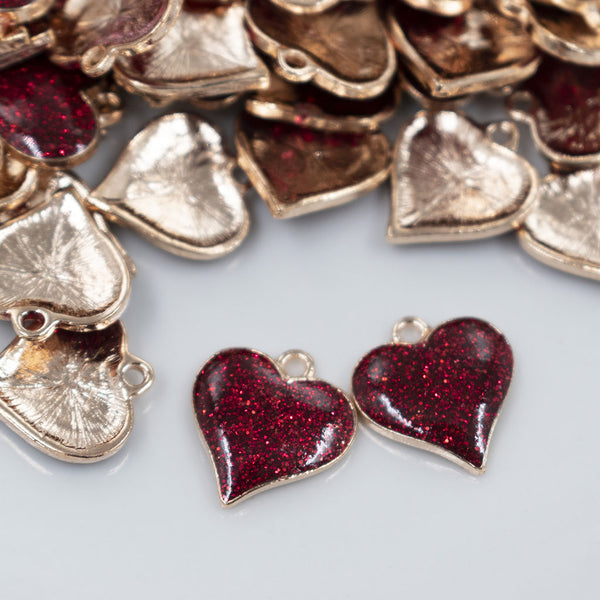 Close up view of Red Glitter Enamel Heart Charm 15mm