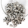 Front view of a pile of Silver Drum Spacer with Charm Mount - Set of 10