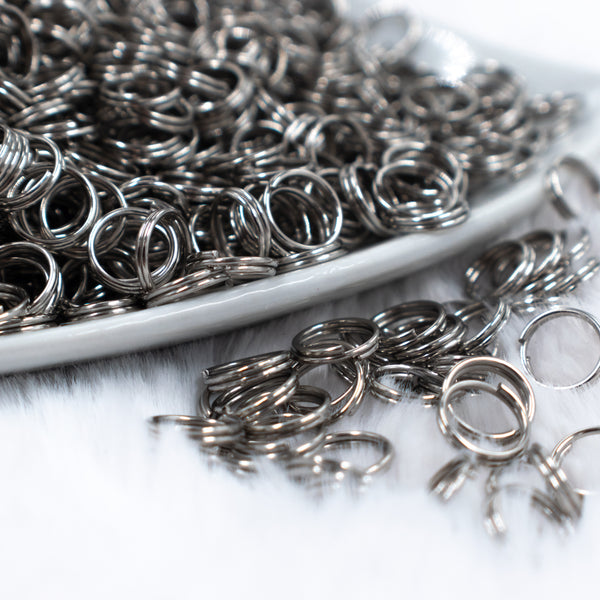 close up view of a pile of 8mm Platinum Iron Split Rings for Jewelry Making