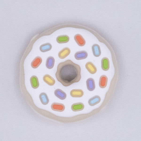 top view of a pile of Donut with White Icing and Sprinkles Silicone Focal Bead Accessory - 28mm
