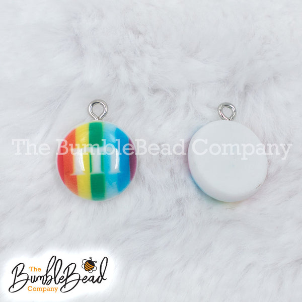 Top picture of a pile of Rainbow 16mm Candy M & M Resin charms