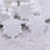 macro view of a pile of White Snowflake Silicone Focal Bead Accessory - 28mm x 28mm