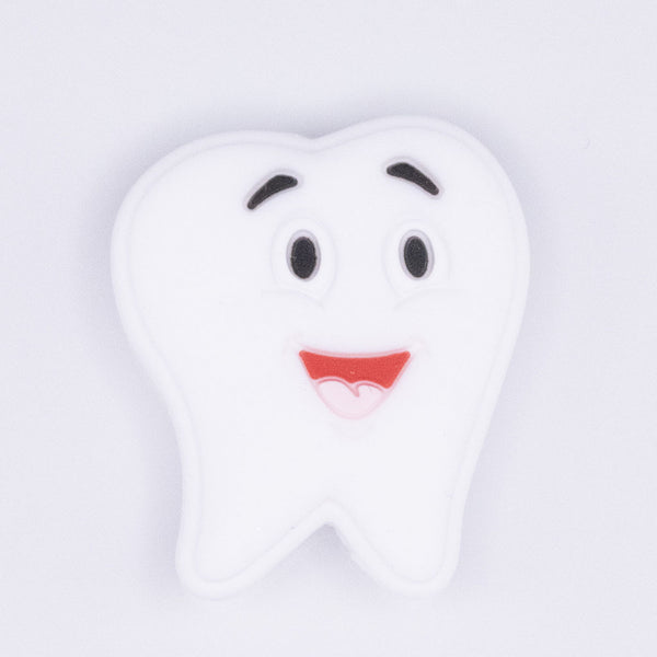 top view of a Tooth Silicone Focal Bead Accessory - 24mm x 27mm