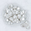 Top view of a pile of 27mm White Pearl Heart Acrylic Bubblegum Beads
