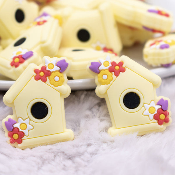 close up view of Yellow Birdhouse Silicone Focal Bead Accessory