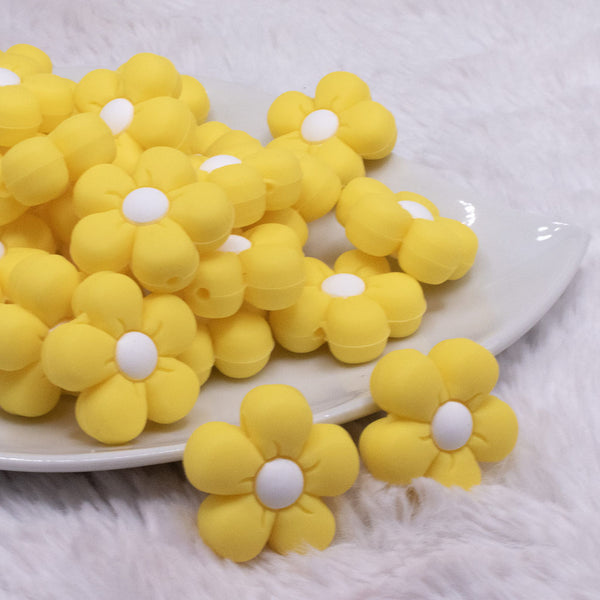 front view of a Yellow Flower Silicone Focal Bead Accessory - 26mm x 26mm