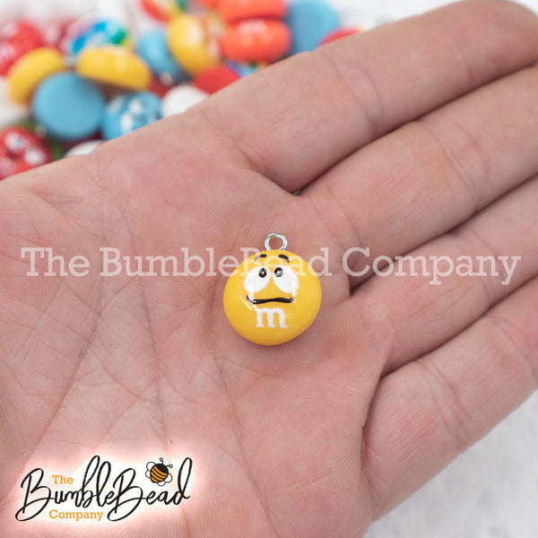 Top picture of a pile of 16mm Candy M & M Resin charms