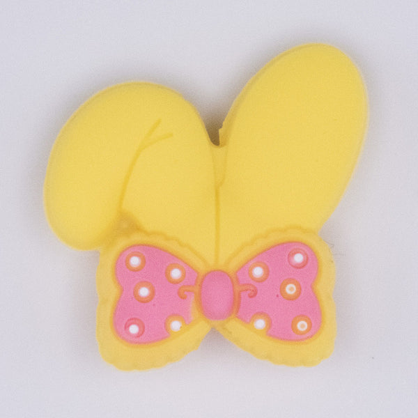 close up view of Yellow Bunny Ears Silicone Focal Bead Accessory - 26mm x 26mm