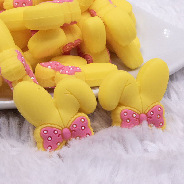 macro view of Yellow Bunny Ears Silicone Focal Bead Accessory - 26mm x 26mm