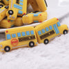 close up view of a pile of Yellow School Bus Silicone Focal Bead Accessory - 18mm x 30mm